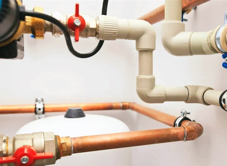 Handyman repairing electrical outlet